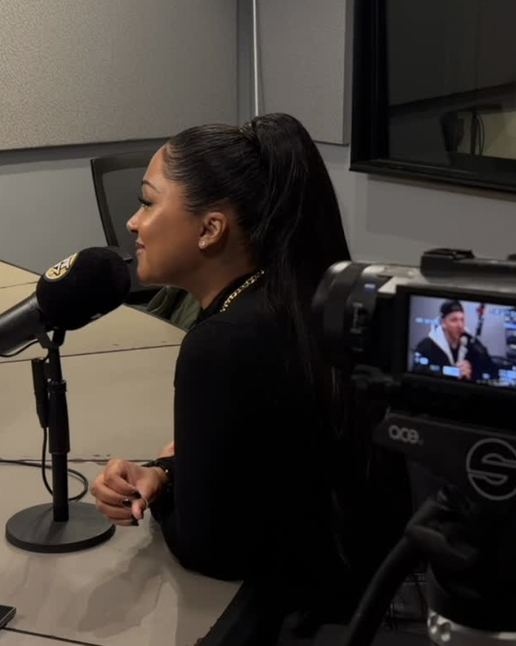Jasmine Ray recording a podcast
